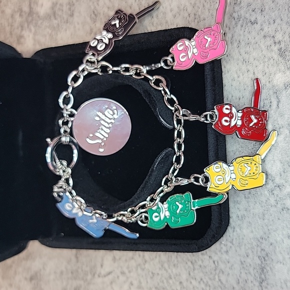 Kit-Cat Klock Charm bracelet clock